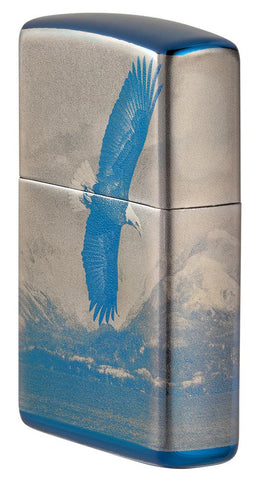 Vue de côté briquet Zippo bleu haute brillance panorama de montagne avec aigle en vol