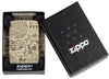 Briquet Zippo 540° vue de face dans le coffret cadeau avec illustration en couleur et fait de métal qui montre des motifs alchimiques qui couvrent toute la surface avec des crânes, des bougies et des écritures mystérieuses.