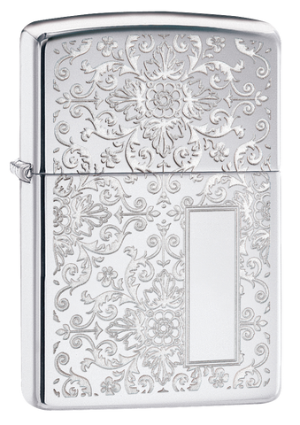 Briquet Zippo vue de face trois quart angle qui montre un design magnifique des fleurs en argent.