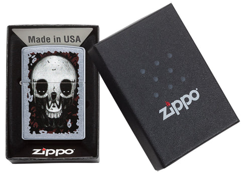 Briquet Zippo chromé illusion d'optique tête de mort, dans une boîte ouverte