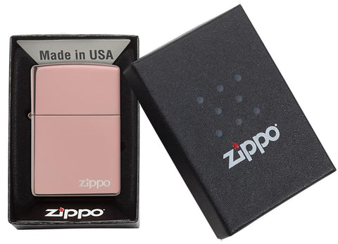Briquet Zippo or rose brillant avec logo Zippo, dans une boîte cadeau ouverte